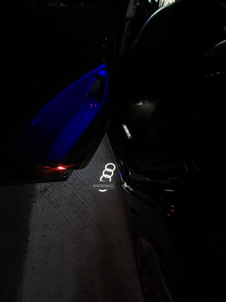 Set 2 Lampi Usa Proiectoare Led Logo Holograma Compatibile Cu Audi - Calitate Oe Accesorii  Iluminat  sigla emblema proiector Audi A1 A3 A4 A5 A6 A7 A8 Q1 Q3 Q4 Q5 Q7